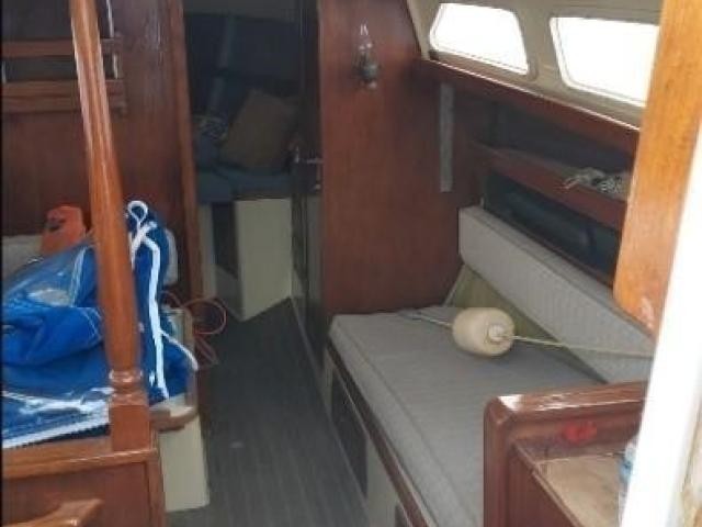 barnish wood of a sail boat, furniture inside of the boat