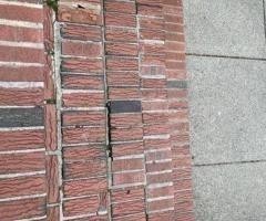 power wash and replace some bad bricks, repoint where it needs it