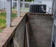 basement bricks walls needs to raise one more feet