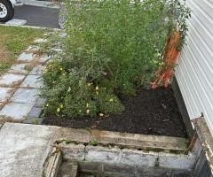 build new retaining wall on top of 2 walls
