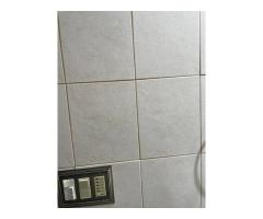 re-grout tile in bathroom